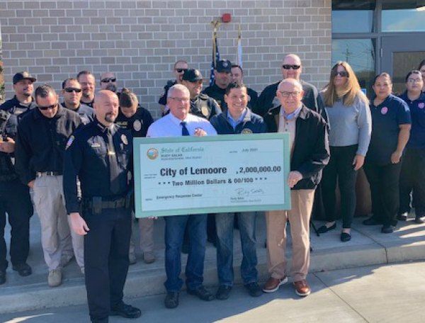 Lemoore public safety dispatch center closer to opening as Assembly's Rudy Salas delivers much-needed funding Assemblyman Rudy Salas presents $2 million to Lemoore city officials Tuesday morning (Oct. 26) outside the new dispatch center. He is joined by city officials and police officers.